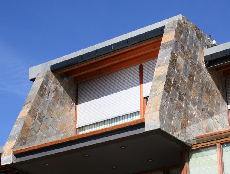 vivienda revestida cuarcita cobre naturpiedra acabado natural